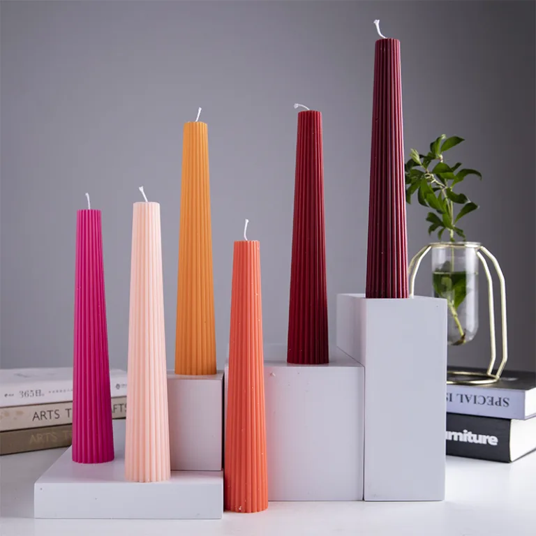 These ribbed taper candles feature a sleek conical shape and soft matte finish, perfect for modern home décor or elegant event styling.