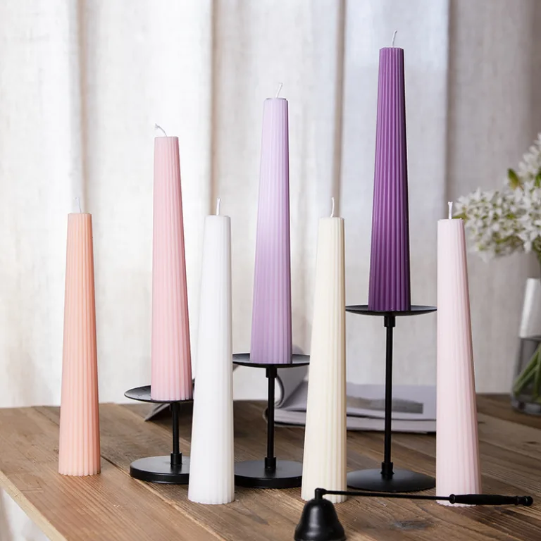 These ribbed taper candles feature a sleek conical shape and soft matte finish, perfect for modern home décor or elegant event styling.