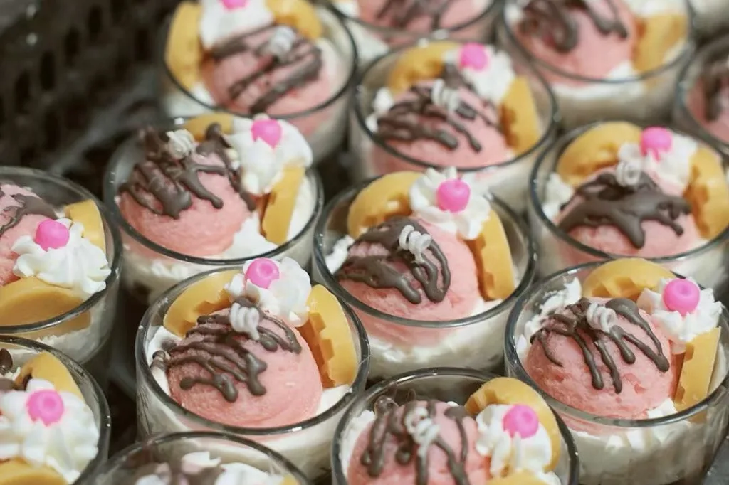 Best Budget Candle Brand Start: Dessert Handmade Candles 4 Batch of dessert cup candles styled like ice cream scoops with chocolate drizzle and fruit decorations